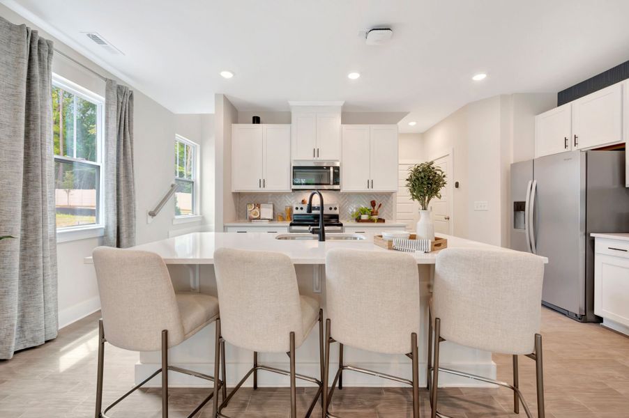 Representative furnished interior of a home built from the Vienna by Mattamy Homes in Ashmore Townes, Garner (Image 5).