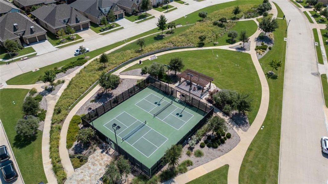 Neighborhood pickleball courts are just one of the many amenities residents enjoy in The Tribute. The community also features a dog park, kids splash pad, playground, canoe and kayak launch, and miles of scenic trails. With frequent events and gathering spaces throughout the neighborhood, The Tribute offers a vibrant lifestyle that can be as social and active as residents choose.