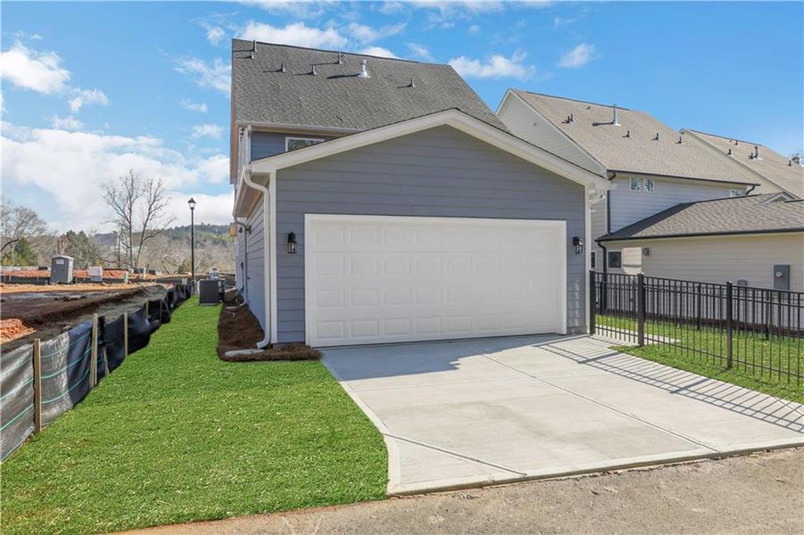 Front exterior of a new home in Marble Tree, Ball Ground, GA, highlighting curb appeal (Image 22).