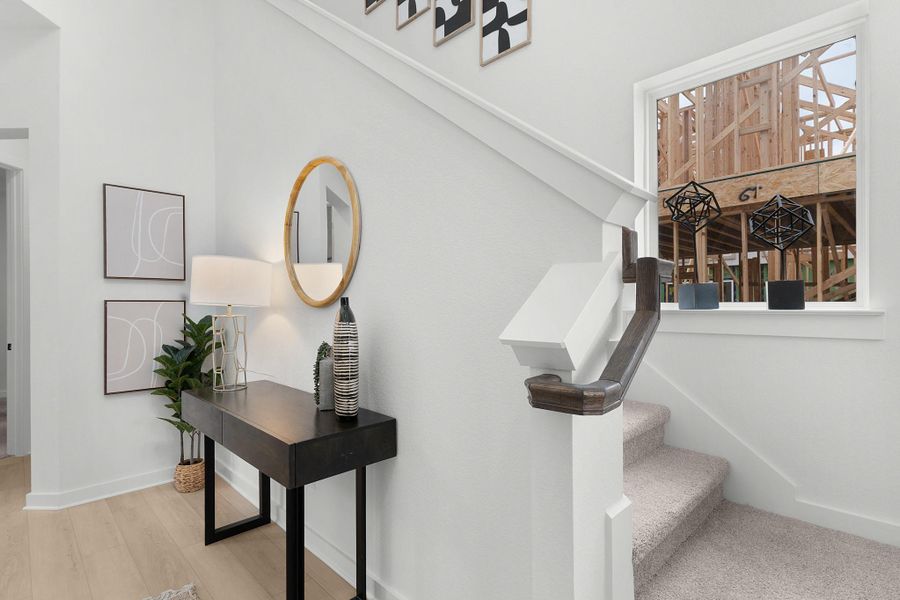 Stairs with wood finished floors and baseboards Stairs with wood finished floors and baseboards