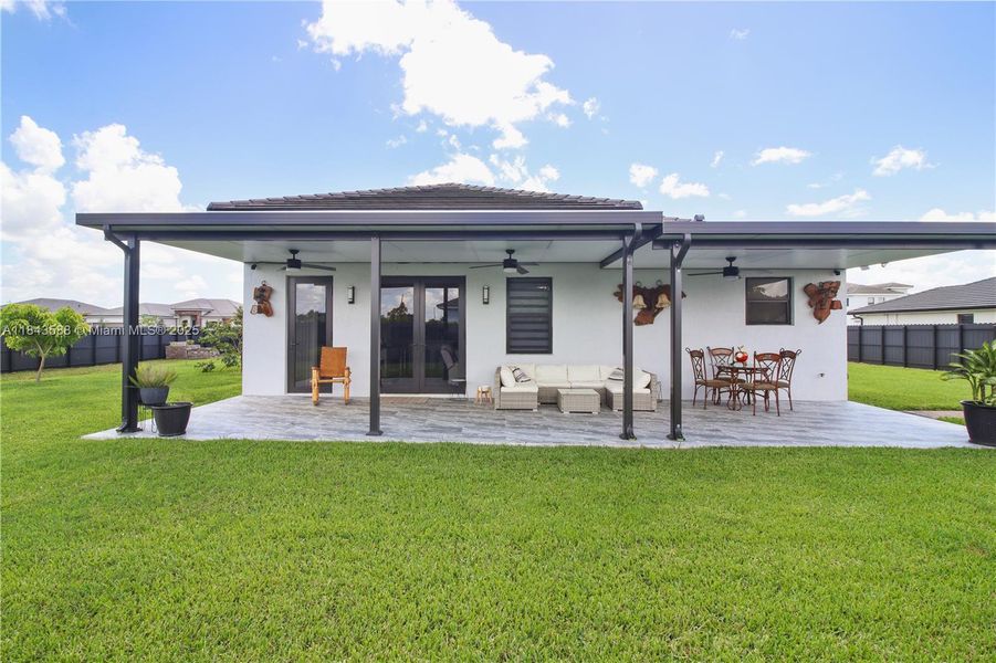 Front exterior of a new home in , Homestead, FL, highlighting curb appeal (Image 21).
