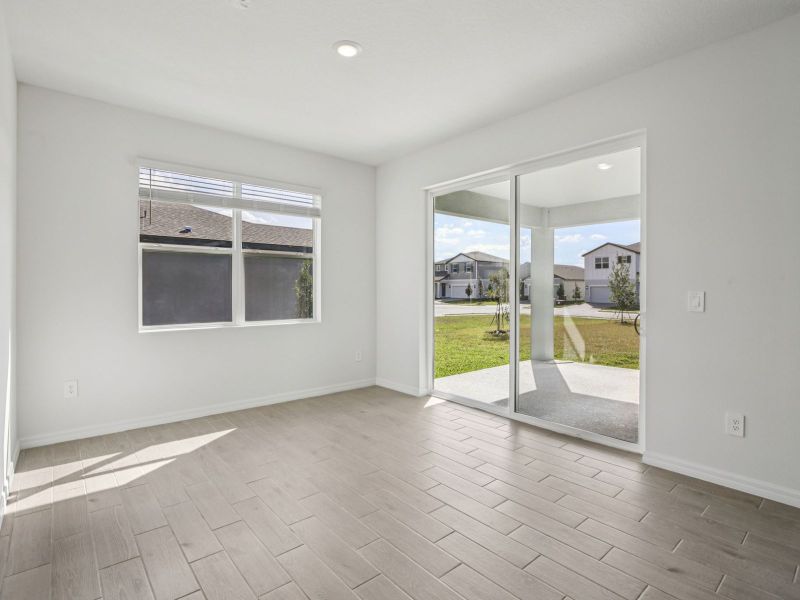 Spacious, unfurnished interior of a new home in Coasterra - Reserve Series, Palmetto (Image 12).