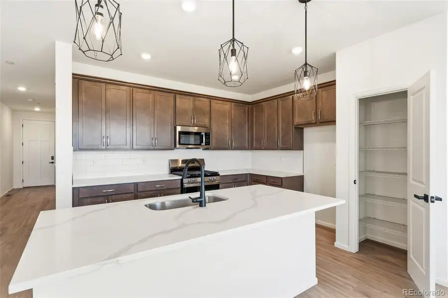 Furnished interior view inside a new home in The Nest Classic at Canyon Creek, Erie (Image 7).