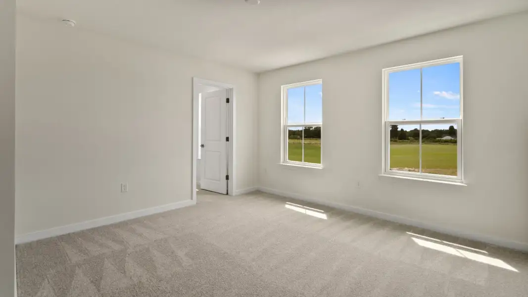 Furnished interior view inside a new home in Willowbrook North, Winter Haven (Image 39).