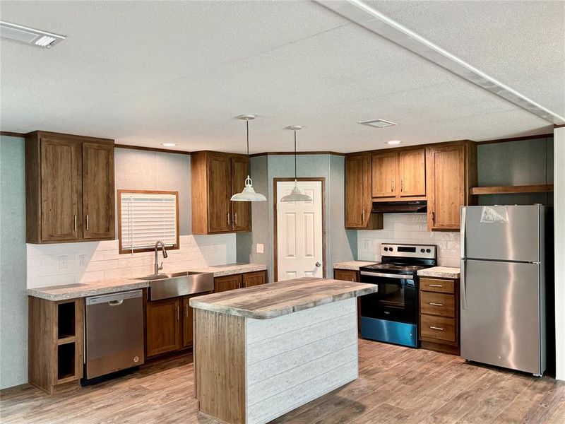 Furnished interior view inside a new home in , Quinlan (Image 4).