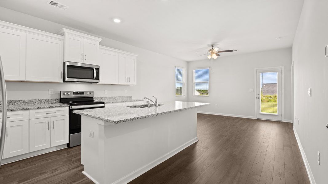 Representative furnished interior of a home built from the Sullivan by D.R. Horton in Byrd Village, Graniteville (Image 4).