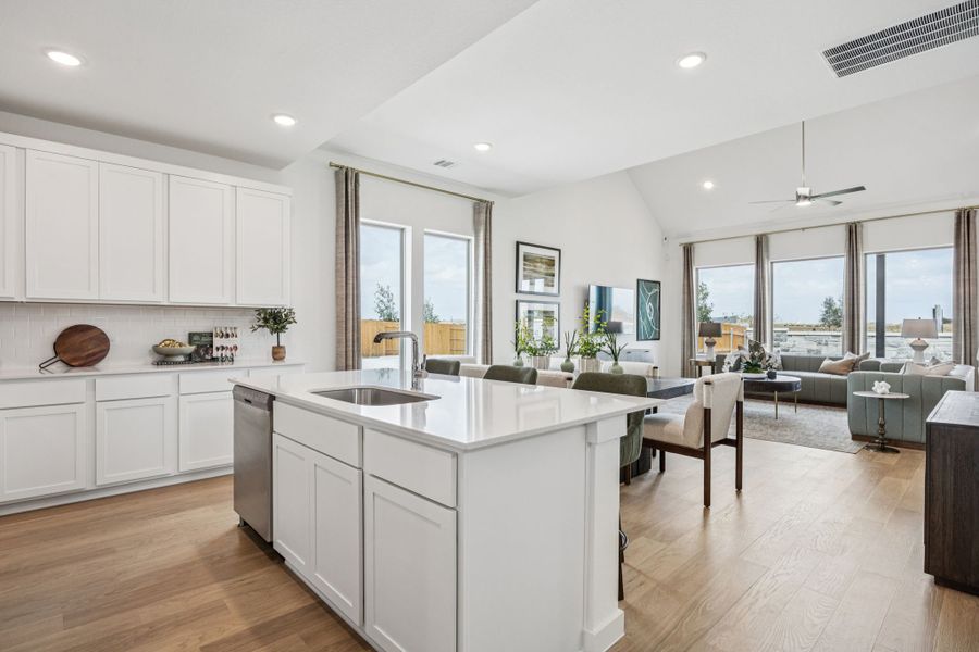 Kitchen in the Trinity home plan by Trophy Signature Homes – REPRESENTATIVE PHOTO
