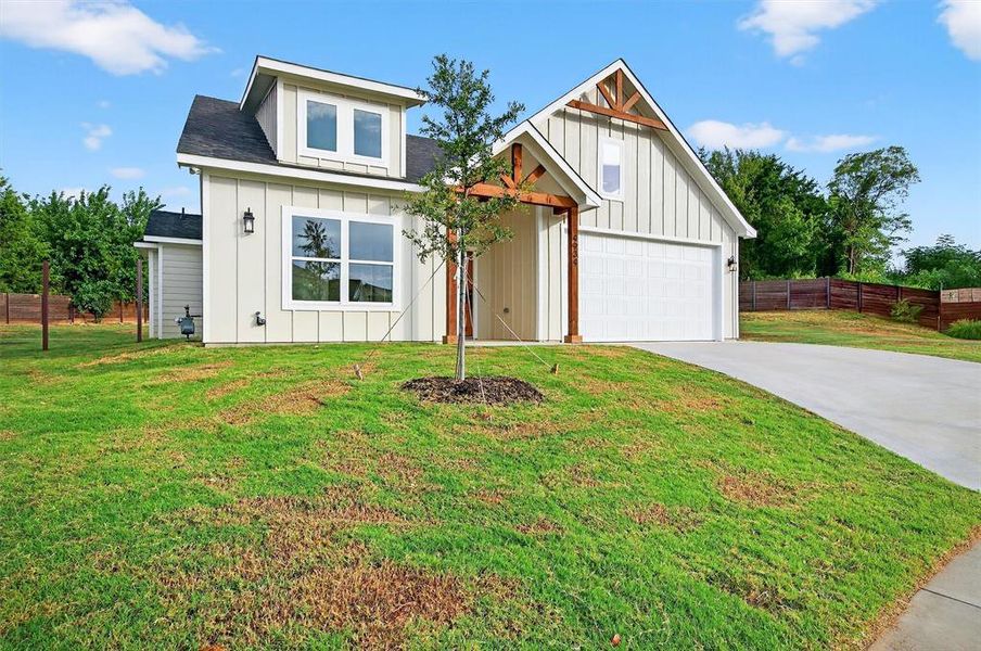 Front exterior of a new home in , Sherman, TX, highlighting curb appeal (Image 2).