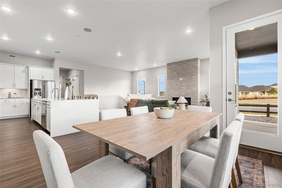 Furnished interior view inside a new home in Hilltop at Inspiration, Aurora (Image 27).