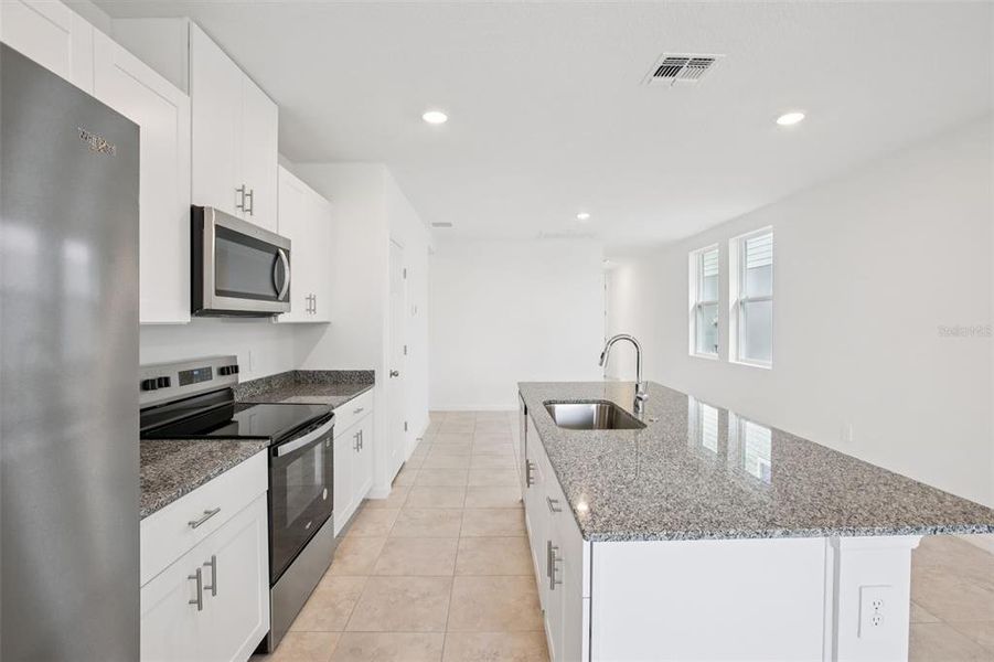 Furnished interior view inside a new home in Villamar - Classic Series, Winter Haven (Image 9).