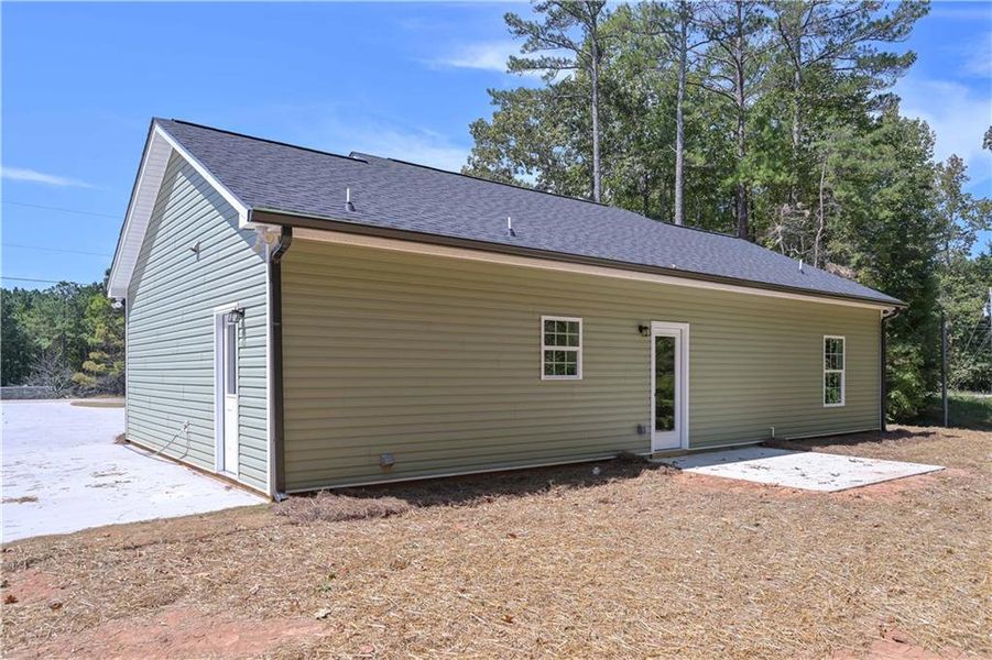 Front exterior of a new home in , Temple, GA, highlighting curb appeal (Image 20).