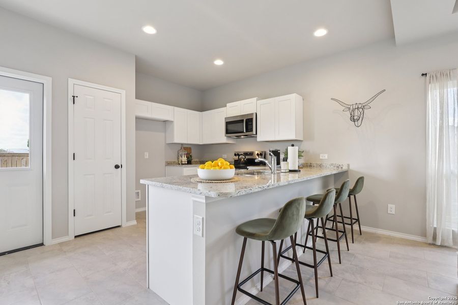 Furnished interior view inside a new home in , San Antonio (Image 11).