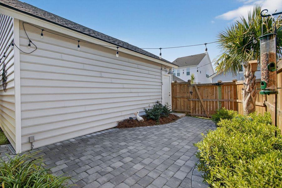 Exterior details and patio area of a home in Sweetgrass at Summers Corner, Summerville (Image 25).