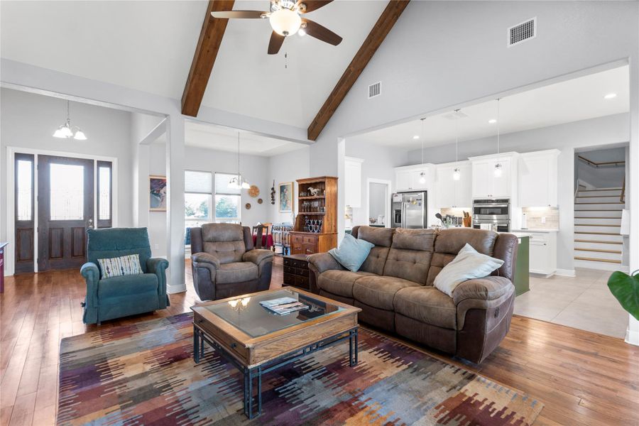 Living area, looking towards front door and dining area