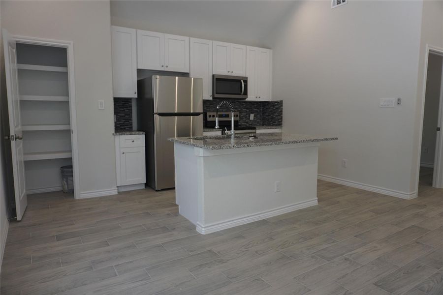 Furnished interior view inside a new home in , Willis (Image 4). Furnished interior view inside a new home in , Willis (Image 4).