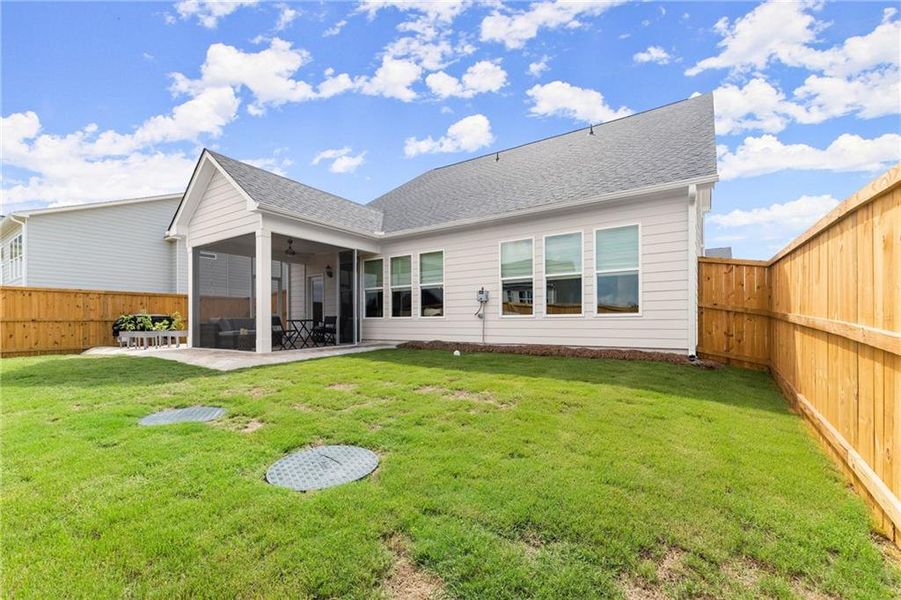 Exterior details and patio area of a home in , Homer (Image 25). Exterior details and patio area of a home in , Homer (Image 25).