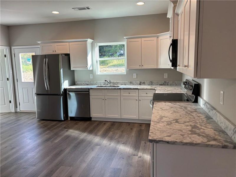 Furnished interior view inside a new home in , Dahlonega (Image 7).