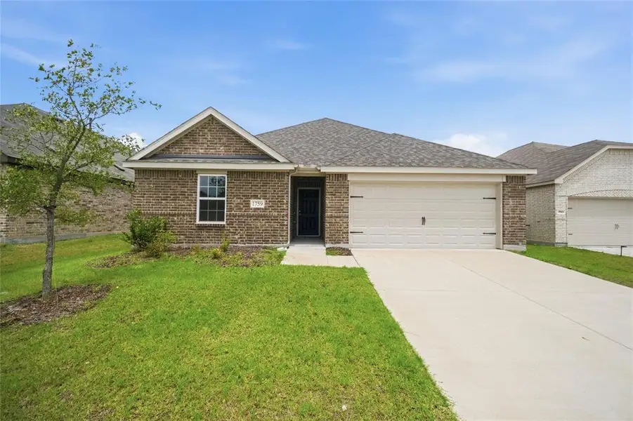 Front exterior of a new home in , Forney, TX, highlighting curb appeal (Image 2). Front exterior of a new home in , Forney, TX, highlighting curb appeal (Image 2).