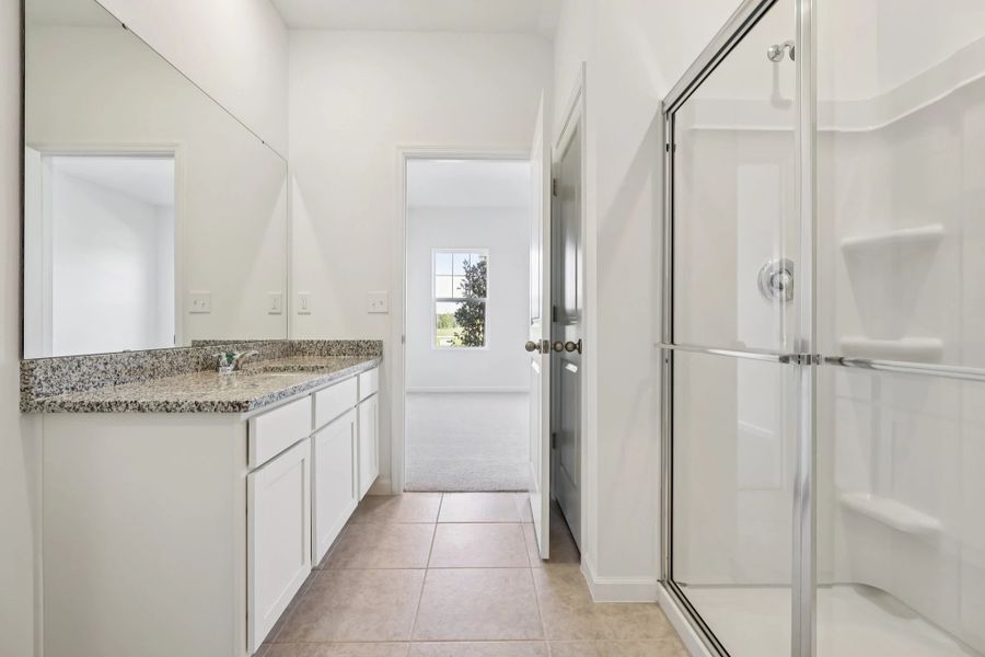 Representative furnished interior of a home built from the Keele by Starlight Homes in Hawks Run, Kissimmee (Image 15).