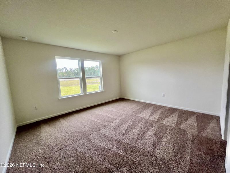 Spacious, unfurnished interior of a new home in Anabelle Island - Executive Series, Green Cove Springs (Image 8).