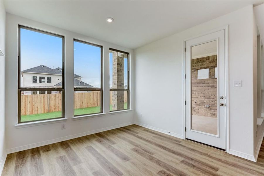 Dining area and patio entrance Representative Photo.