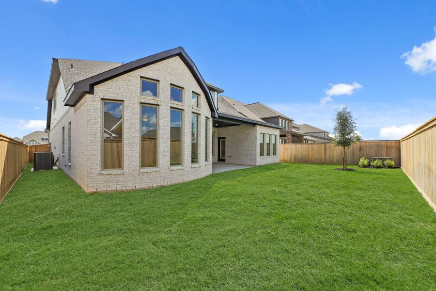 Exterior details and patio area of a home in Bridgeland 55', Cypress (Image 19).