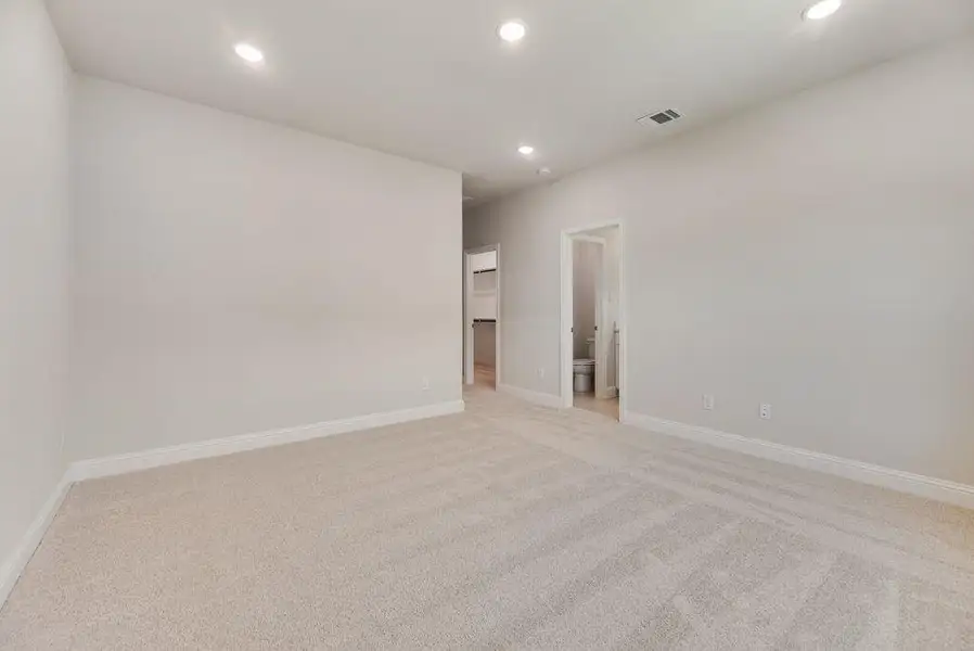 Spacious, unfurnished interior of a new home in Bayside, Rowlett (Image 18). Spacious, unfurnished interior of a new home in Bayside, Rowlett (Image 18).