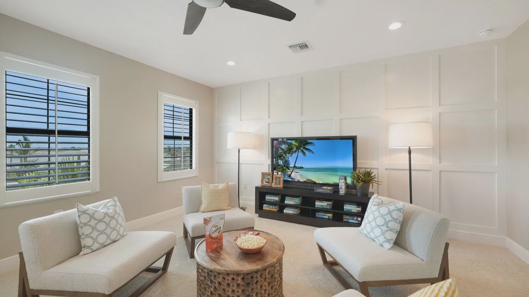 Representative furnished interior of a home built from the Artistry by Neal Communities in SkySail, Naples (Image 14).