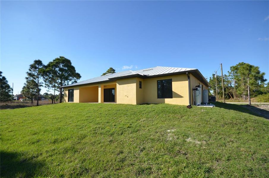 Exterior details and patio area of a home in , Lehigh Acres (Image 22).