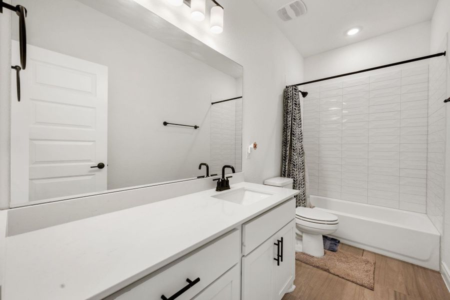 Furnished interior view inside a new home in Cedar Brook, Leander (Image 11).
