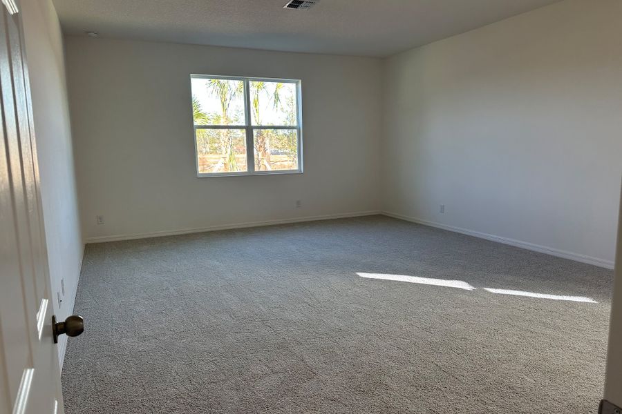 Spacious and Relaxing Primary Bedroom in Central Florida Home