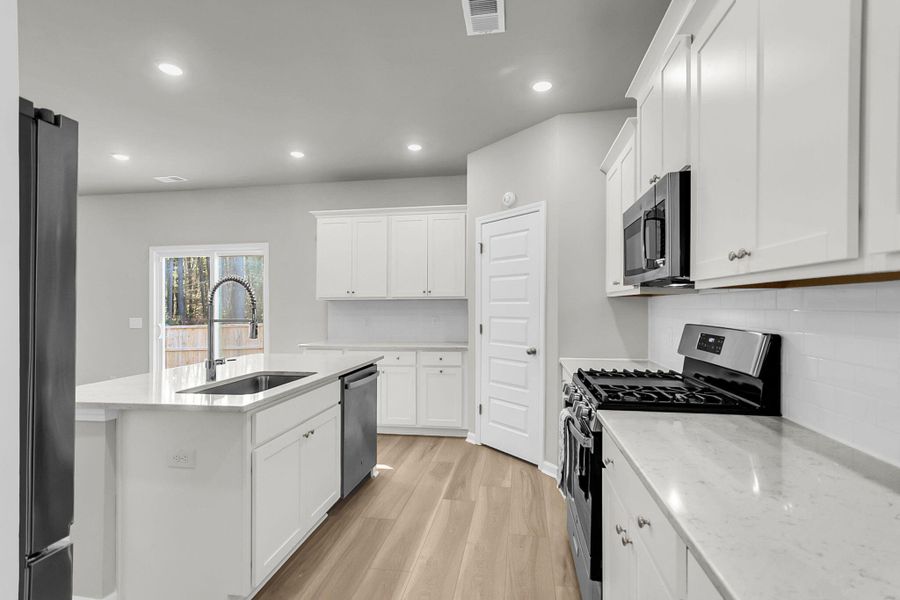 Furnished interior view inside a new home in Limehouse Village: Arbor Series, Summerville (Image 16).