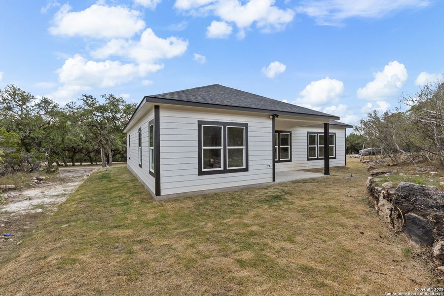 Exterior details and patio area of a home in , Spring Branch (Image 18). Exterior details and patio area of a home in , Spring Branch (Image 18).