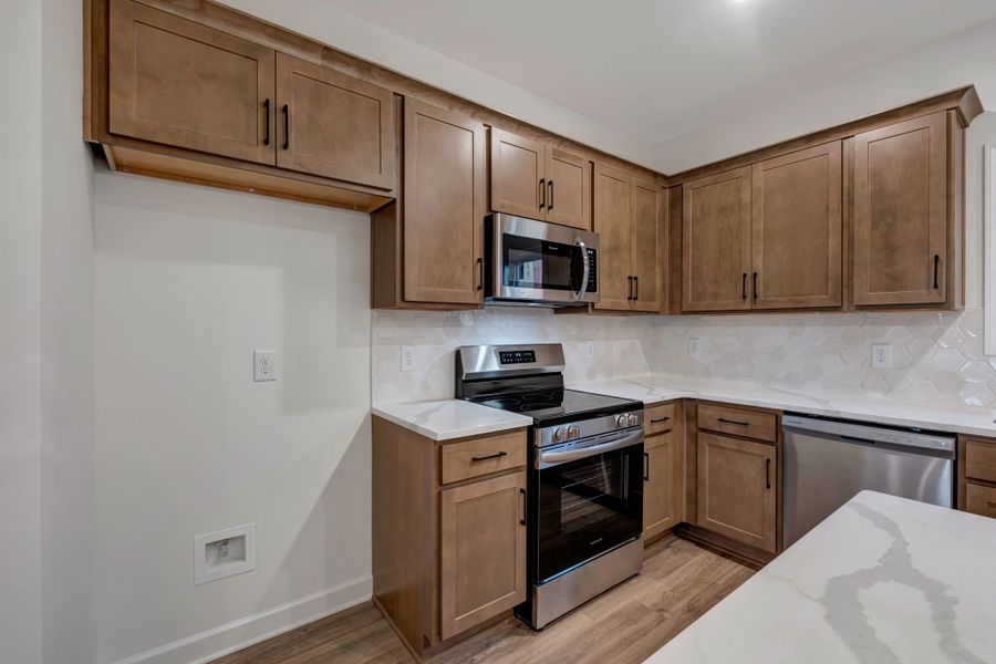 Representative furnished interior of a home built from the Ingram Rowhome by Parkside Builders in Anderson Park, Hendersonville (Image 34).