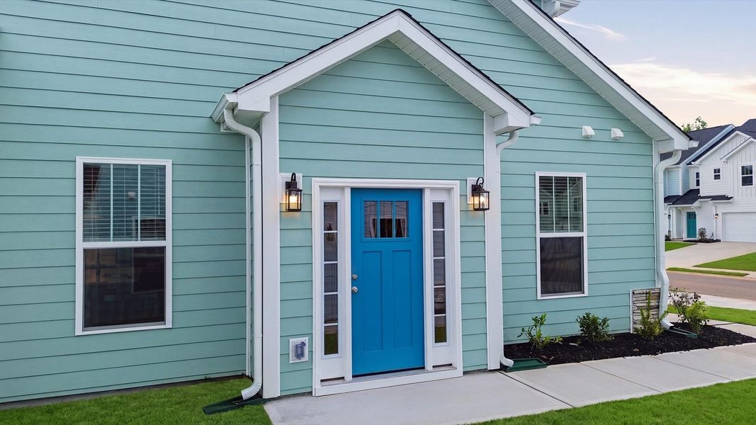 Exterior details and patio area of a home in Village at Midway, Anderson (Image 3).