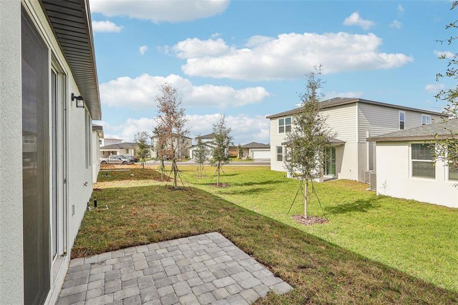 Exterior details and patio area of a home in Wynnstone - Classic Series, Haines City (Image 19).