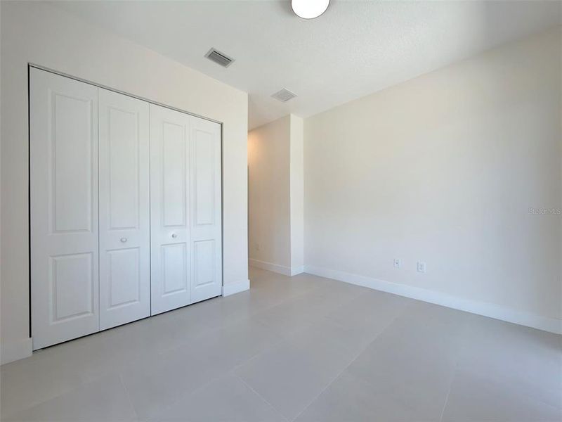 Spacious, unfurnished interior of a new home in , Port Charlotte (Image 40).
