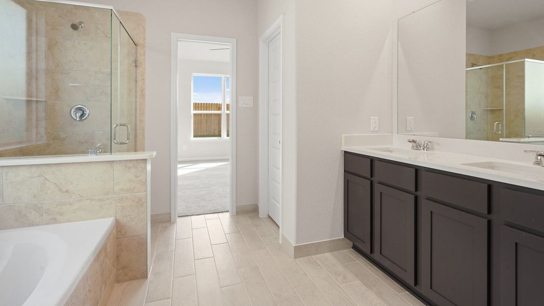 Representative furnished interior of a home built from the The Benbrook by Legend Homes in Bluestem, Brookshire (Image 6).