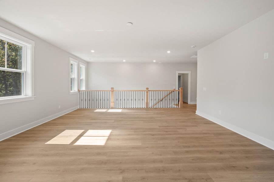 Spacious, unfurnished interior of a new home in Charleston County Homes, Mount Pleasant (Image 25).