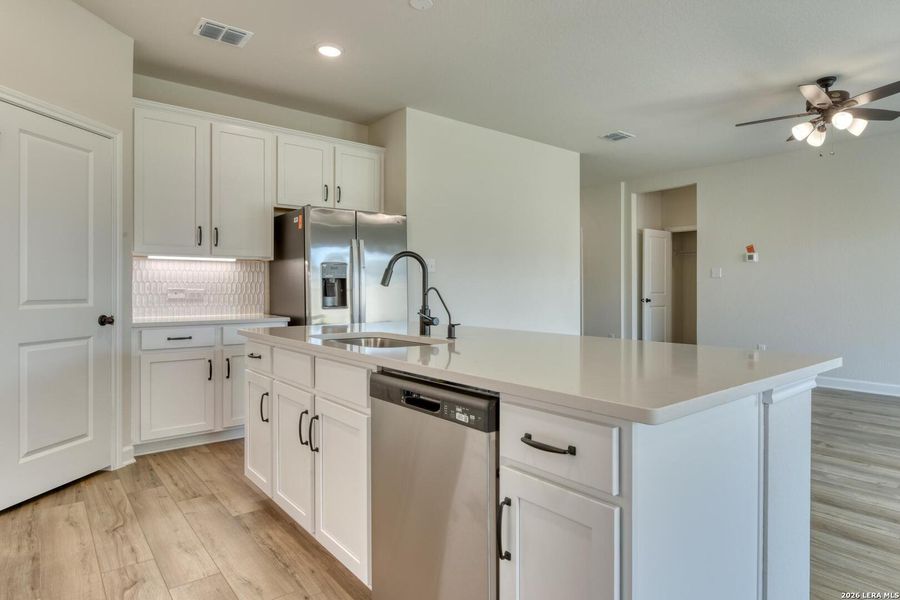 Furnished interior view inside a new home in Nopal Valley, San Antonio (Image 8).