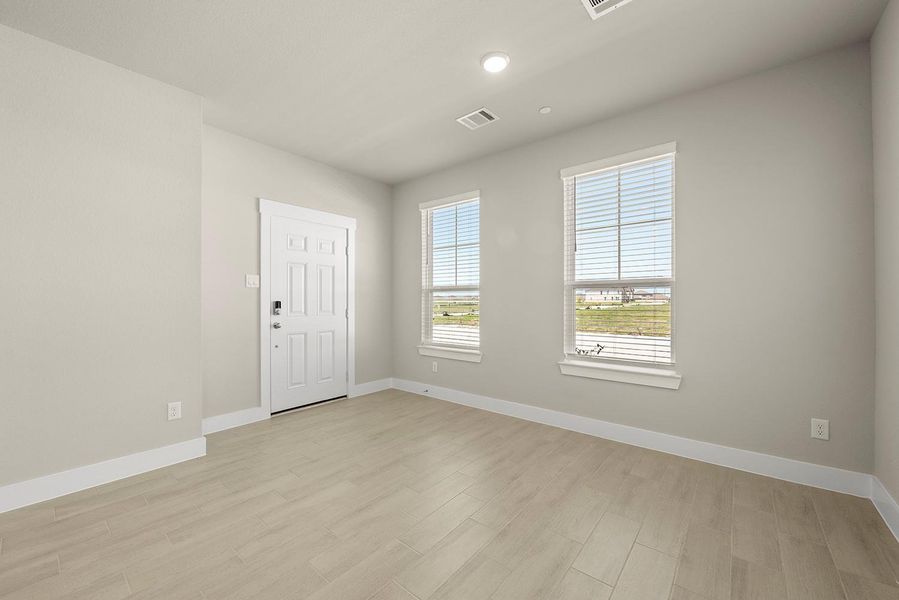 This dining area is a space where every meal is an occasion, and every moment spent here feels special. Welcome home! This dining area is a space where every meal is an occasion, and every moment spent here feels special. Welcome home!