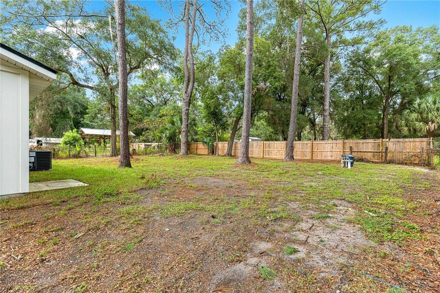 Exterior details and patio area of a home in , Fort McCoy (Image 13).
