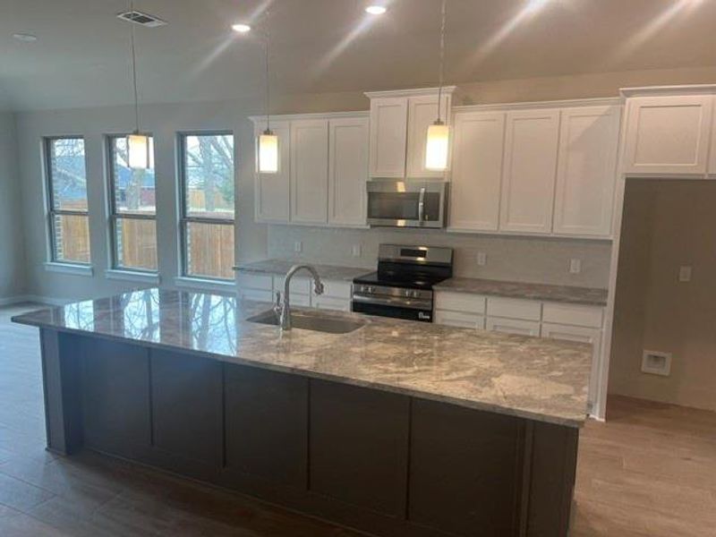 Furnished interior view inside a new home in , Van Alstyne (Image 6).