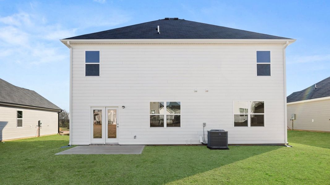 Exterior details and patio area of a home in The Preserve at Agricultural Village, Perry (Image 3).