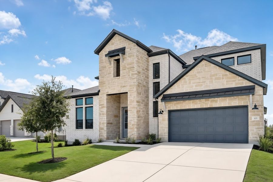 Front exterior of a new home in Santa Rita Ranch, Liberty Hill, TX, highlighting curb appeal (Image 18).