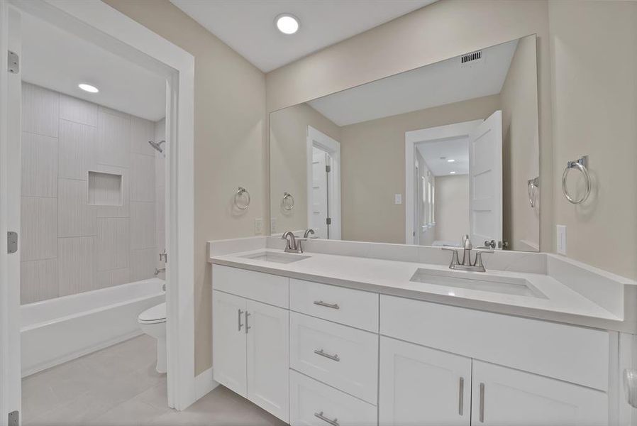 Furnished interior view inside a new home in , The Colony (Image 14).