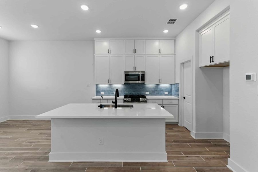 Furnished interior view inside a new home in Rose Hill, San Antonio (Image 7).