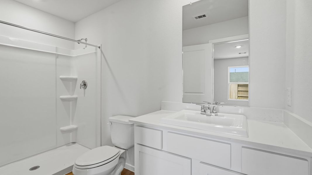 Furnished interior view inside a new home in Sunterra, Katy (Image 7).