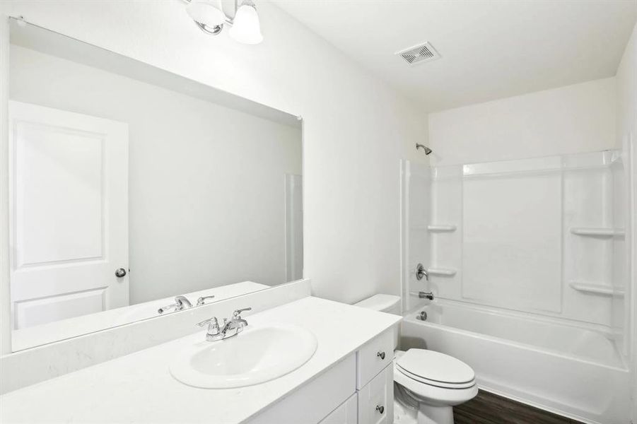 Furnished interior view inside a new home in Broadmoor Village, Cedar Hill (Image 12).