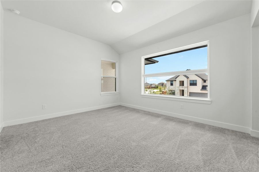 Spacious, unfurnished interior of a new home in Sunterra, Katy (Image 15).